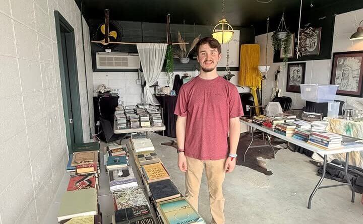 Andy selling books, CDs and vintage items at The Cut-Off, Ripley Main Street says Photos from Ripley Main Street's post