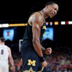 Michigan routs Arizona, advances to men's national championship Michigan routs Arizona to advance to men's national championship, will take on UConn