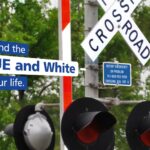 Awareness day urges drivers to find blue-and-white ENS signs Rail Safety: Find the Blue and White ENS Sign