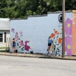 Artist creating Native American and wildflower mural in downtown Ripley 🌸 Something beautiful is blooming in Downtown Ripley!