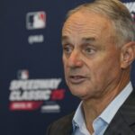 Justice Department opens probe into MLB over warnings for players' Bible-verse caps DOJ opens probe into MLB after Pride Night controversy