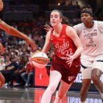 WNBA game sees security confront heckling fans as Aces edge Fever in OT thriller Aces star targets heckling Fever fans in Indy before Chelsea Gray stuns Caitlin Clark in OT thriller