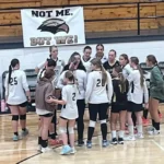 Tippah County sports roundup, Sept. 16, 2026: Falkner rallies; BMCU golfers take second Falkner volleyball players gather in a team huddle beside the bench.