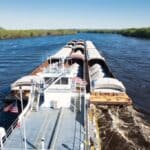 Mississippi News Report — Sunday, Sep 27: Port Expansion, Drought Cargo barge moving freight on a river at the Yellow Creek Port near Iuka, Mississippi