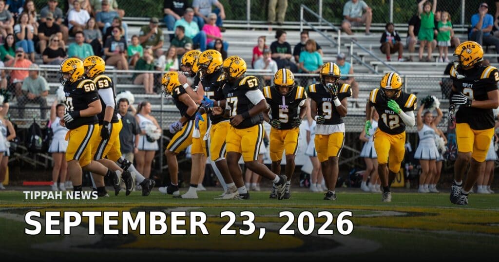 Ripley Tigers players run onto the field at Tiger Stadium in front of fans in the stands ahead of Homecoming week