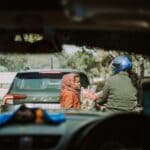 Understanding How GAP Insurance Works Parent handing car keys to a new car owner
