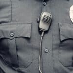 Hardeman County Sheriff's Office Announces Promotions Close-up of a law enforcement officer's uniform with badge and body camera, illustrating Hardeman County Sheriff's Office promotions