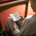 Middleton Ladies Day at Porters Creek Set for Oct. 10 Woman reading in a church pew, illustrating Middleton Ladies Day at Porters Creek