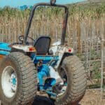 Walley Seeks Dyed Diesel Exemption for Hardeman County Farmers Blue tractor parked in a farm field, illustrating the dyed diesel exemption request for farmers