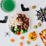 The 5 Best Halloween Party Supplies for Tippah County Gatherings Festive Halloween candies and decorations arranged on a party table — table-setting ideas for Tippah County Halloween parties.