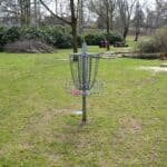 Bolivar Disc Golf Tournament Set Nov. 7 at Pleasant Run Disc golf basket in a sunny park, illustrating the Bolivar disc golf tournament at Pleasant Run Creek Park