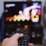 Tippah County roundup, Oct. 17, 2026: Dateline revisits Carpenter case; local districts earn B grades Person holding a TV remote while watching television, illustrating the Kirby Carpenter Dateline episode on NBC