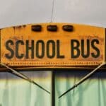 Mississippi News Report — Sunday, Oct 4: JSU Rallies, Fall Break Close-up of a yellow school bus sign, illustrating DeSoto County Schools fall break Oct. 5-9