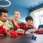 Hardeman County STEM Center Brings Drones, Robotics to Students Students and a teacher build a robotics project, illustrating hands-on learning at the Hardeman County STEM Center