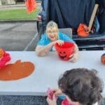 Ripley, Walnut Trunk or Treat Events Set for Halloween Weekend Costumed volunteer hands out candy from a decorated car trunk at a church trunk or treat event