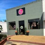 Silly Sisters Opens New Shop on the Ripley Square Silly Sisters Ripley storefront with a pink sign, fall mums and clothing displays on the Ripley square