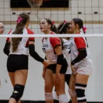 Tippah County sports roundup, Oct. 11, 2026: Walnut takes winning streak into North State; BMCU falls Volleyball players in red and white Wildcats uniforms gather beside the net.