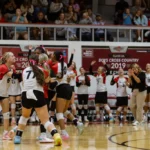 Tippah County sports roundup, Oct. 13, 2026: Walnut finishes 31–5 as title defense ends Walnut volleyball players celebrate together on the court as teammates and spectators cheer.