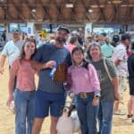 Tippah County 4-H Goat Exhibitors Show at Mississippi State Fair Tippah County 4-H exhibitor with her market goat, a ribbon and family at the Mississippi State Fair goat show