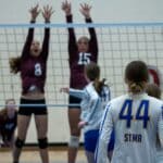 Walnut Volleyball Faces Unbeaten East Union for North State Title High school volleyball players at the net, an illustration for Walnut volleyball's North State final